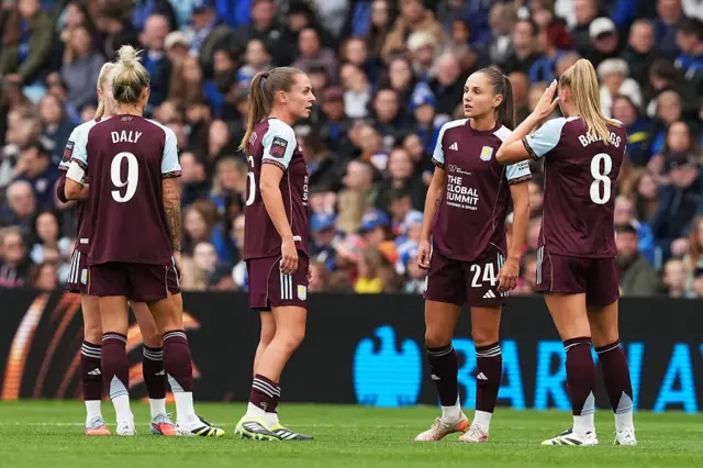 Noelle Maritz speaks to Oceane Deslandes of Aston Villa during the Barclays Women's Super League match between Aston Villa and Chelsea FC at Villa Park on September 14, 2025 in Birmingham, England.