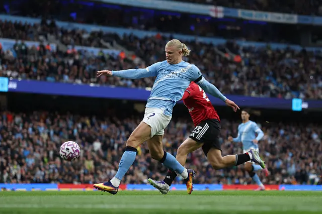 Erling Haaland of Manchester City scores
