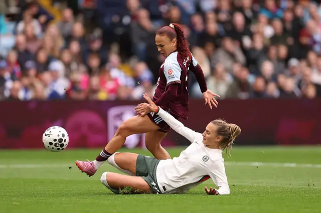 Ebony Salmon of Aston Villa has a shot blocked by Nathalie Bjoern of Chelsea during the Barclays Women's Super League match between Aston Villa and Chelsea FC at Villa Park on September 14, 2025 in Birmingham, England.