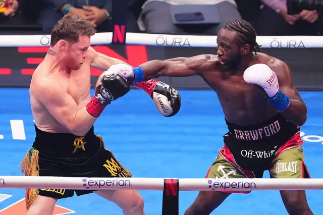 Saul Canelo Alvarez and Terence Crawford in the ring