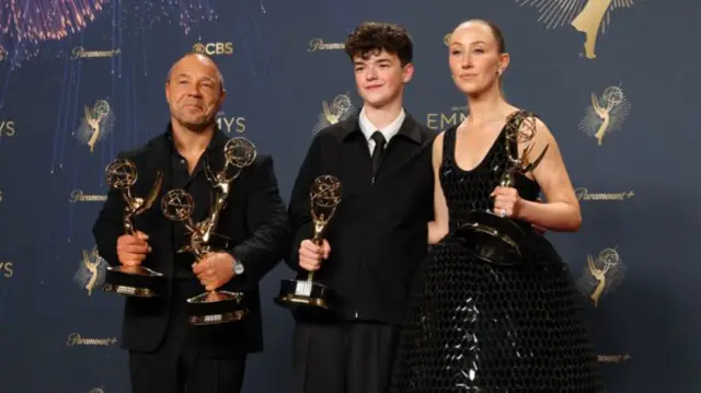 Stephen Graham, winner of Best Lead Actor in a Limited or Anthology Series or Movie and Best Writing for a Limited or Anthology Series or Movie, Owen Cooper, Best Supporting Actor in a Limited or Anthology Series or Movie, and Erin Doherty, Best Supporting Actress in a Limited or Anthology Series or Movie, for "Adolescence", Best Limited or Anthology Series pose with their awards at the 77th Primetime Emmy Awards in Los Angeles, California