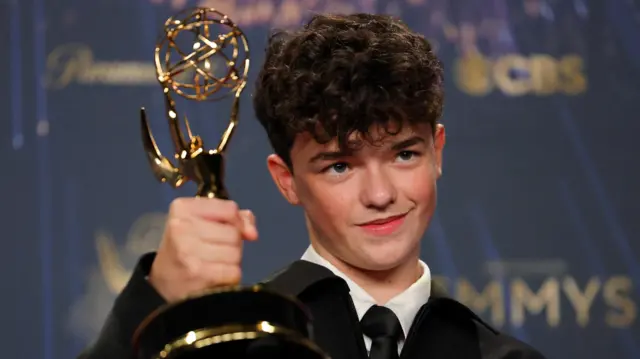 Owen Cooper poses with the Best Supporting Actor in a Limited or Anthology Series or Movie award for Adolescence, at the 77th Primetime Emmy Awards in Los Angeles, California