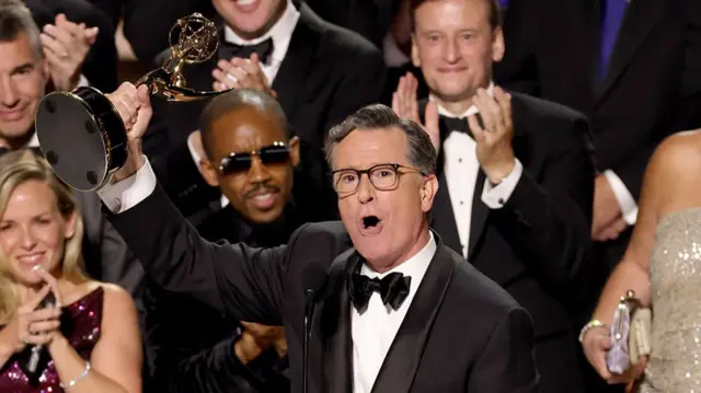 : Stephen Colbert accepts the Outstanding Talk Series Award for "The Late Show with Stephen Colbert" onstage during the 77th Primetime Emmy Awards at Peacock Theater on September 14, 2025 in Los Angeles
