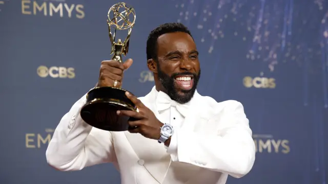 Tramell Tillman, winner of the award for outstanding supporting actor in a drama series for 'Severance,' poses with his award