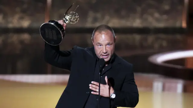 Stephen Graham accepts the Emmy for Outstanding Writing for a Limited or Anthology Series or Movie for Adolescence during the 77th annual Emmy Awards ceremony held at the Peacock Theater in Los Angeles, California, USA, 14 September 2025.