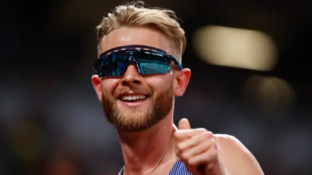 Britain's Josh Kerr celebrates after qualifying during the heats