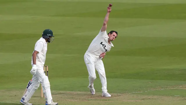 Dan Worrall bowling for Surrey