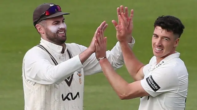 Matt Fisher takes a wicket