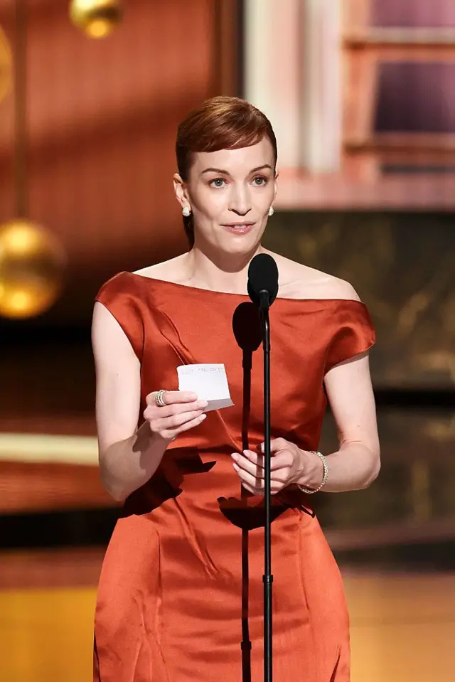 Britt Lower accepts the an Emmy award