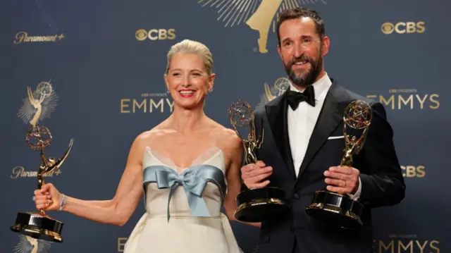 Katherine LaNasa Best Supporting Actress in a Drama Series, and Noah Wyle Best Actor in a Drama Series for "The Pitt", which won Best Drama Series, pose at the 77th Primetime Emmy Awards in Los Angeles, California