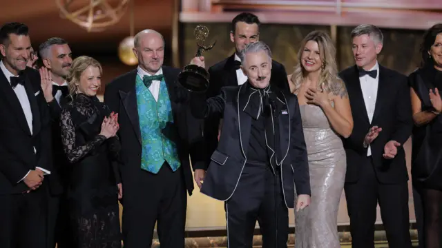 Alan Cumming accepts the award for Outstanding Reality Competition Program for "The Traitors" at the 77th Primetime Emmy Awards in Los Angeles, California, U.S., September 14, 2025.