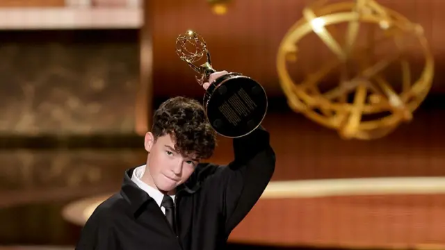 Owen Cooper accepts the Outstanding Supporting Actor in a Limited or Anthology Series or Movie award for "Adolescence" onstage during the 77th Primetime Emmy Awards at Peacock Theater on September 14, 2025 in Los Angeles, California.
