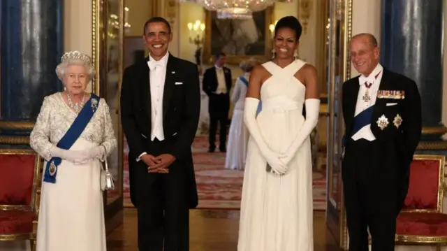 Queen Elizabeth II poses with US President Barack Obama, his wife Michelle Obama and Prince Philip, Duke of Edinburgh in the Music Room of Buckingham Palace ahead of a state banquet on 24 May, 2011 in London, England