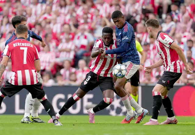 Athletic Bilbao's Ghanaian forward #09 Inaki Williams clases with Arsenal's Spanish defender #03 Cristhian Mosquera (2R) during the UEFA Champions League first round day 1 football match between Athletic Club Bilbao and Arsenal at the San Mames stadium in Bilbao