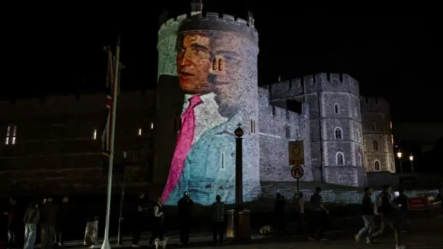 Donald Trump and Jeffrey Epstein picture is displayed over Windsor Castle