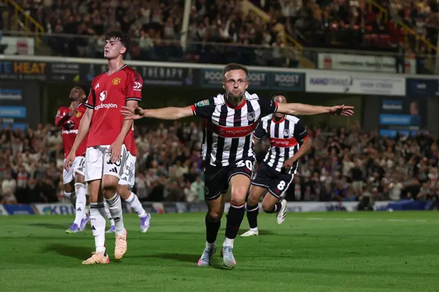 Grimsby score against Manchester United
