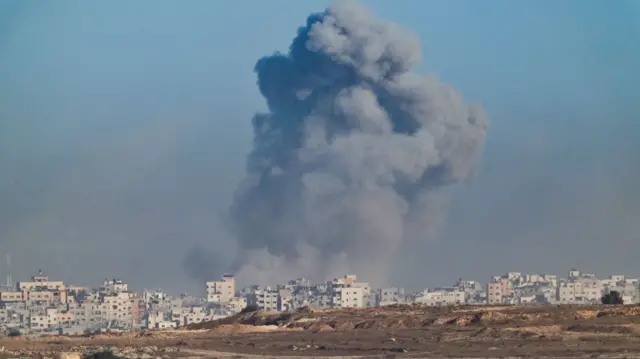 An explosion in Gaza, as seen from the Israeli side of the border on 16 September