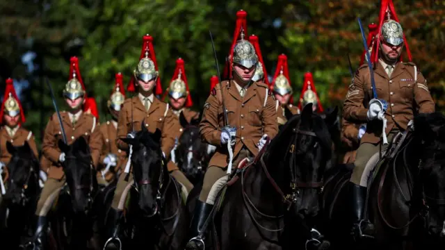 Military personnel on horseback