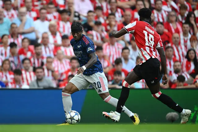 Noni Madueke of Arsenal runs with the ball during the UEFA Champions League 2025/26 League Phase MD1 match between Athletic Club and Arsenal FC at Estadio de San Mames on September 16, 2025 in Bilbao, Spain.