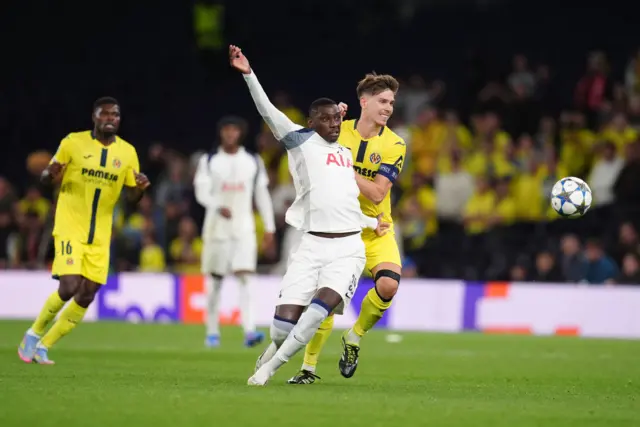 Tottenham Hotspur's Randal Kolo Muani and Villarreal's Juan Foyth (right) battle for the bal