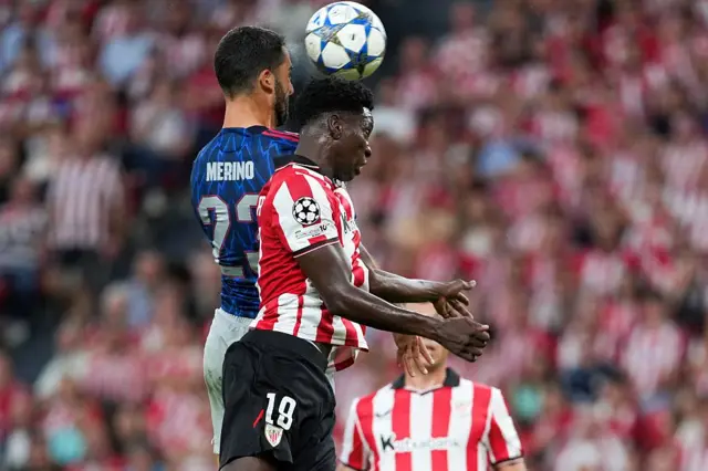 Arsenal's Spanish midfielder #23 Mikel Merino and Athletic Bilbao's Spanish defender #19 Adama Boiro vie for a header during the UEFA Champions League first round day 1 football match between Athletic Club Bilbao and Arsenal at the San Mames stadium in Bilbao on September 16, 2025.