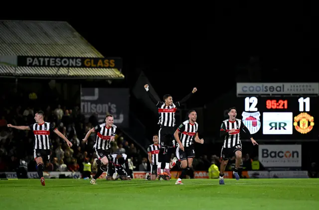 Grimsby players celebrate