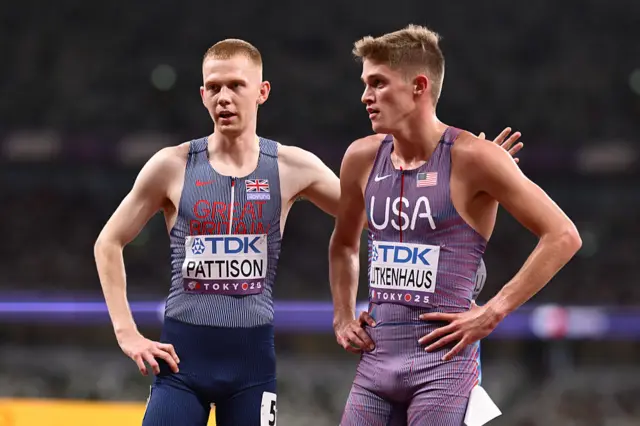 Ben Pattison of Team Great Britain interacts with Cooper Lutkenhaus of Team United States
