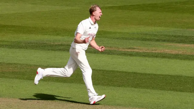 Lyndon James runs away to celebrate a wicket for Notts at Surrey
