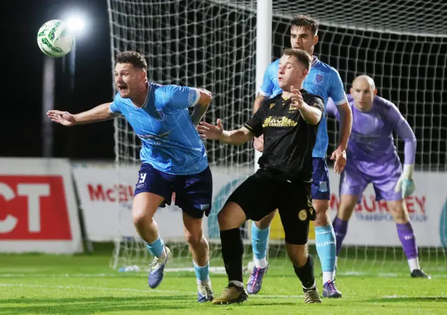 Ben Kennedy challenges for the ball