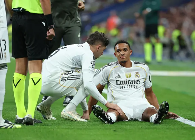 Real Madrid's English defender #12 Trent Alexander-Arnold reacts on the ground after suffering an injury during the UEFA Champions League first round day 1 football match between Real Madrid CF and Olympique de Marseille at the Santiago Bernabeu stadium in Madrid on September 16, 2025. (