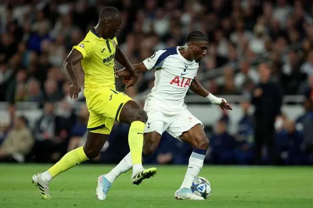 Pape Gueye of Villarreal CF and Mohammed Kudus of Tottenham Hotspur challenge during the UEFA Champions League 2025/26 League Phase MD1 match between Tottenham Hotspur and Villarreal CF at Tottenham Hotspur Stadium on September 16, 2025 in London, England.