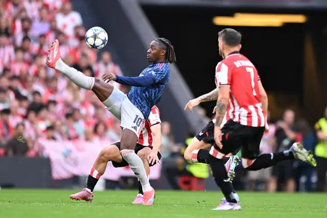 Eberechi Eze of Arsenal, Alex Berenguer of Athletic Club during the UEFA Champions League match between Athletic de Bilbao v Arsenal at the San Mames Stadium on September 16, 2025 in Bilbao Spain
