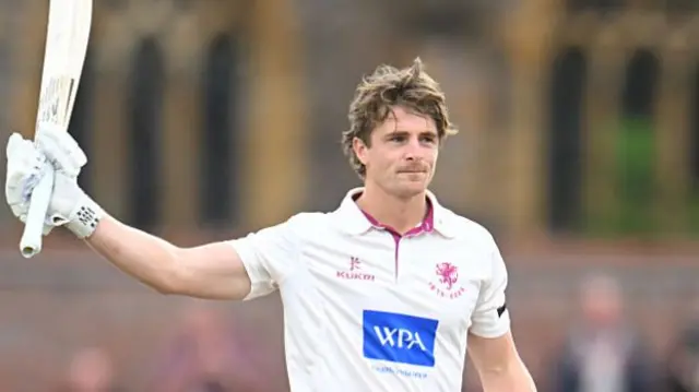 Tom Abell raises his bat