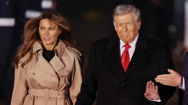 U.S. President Donald Trump and first lady Melania Trump are greeted by Viscount Henry Hood, representing Britain's King Charles, as they arrive for their state visit to Britain, at London Stansted Airport near London, Britain, September 16, 2025.