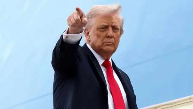 U.S. President Donald Trump boards Air Force One