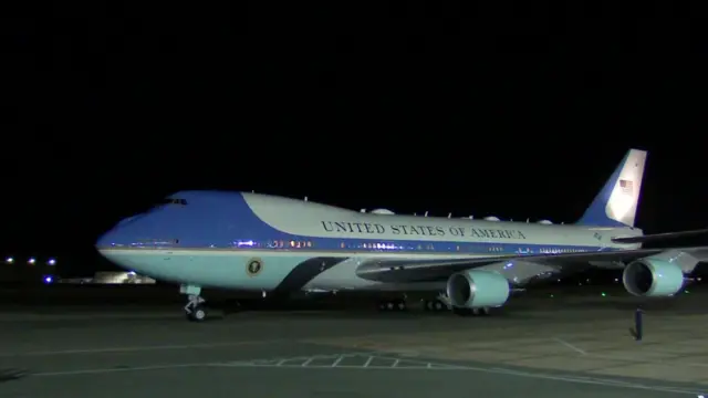 It's dark. Air Force One plane has landed on runway.