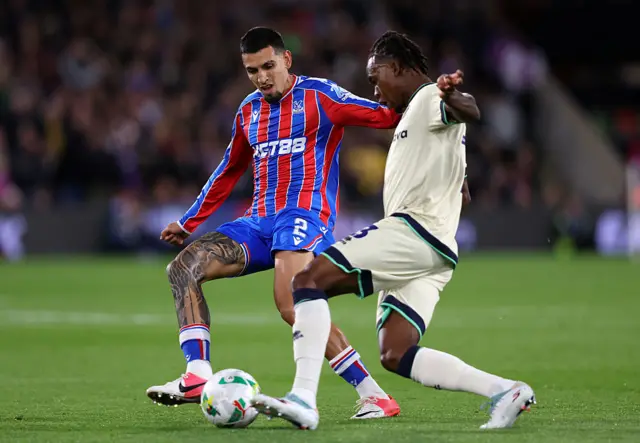 Daniel Munoz of Crystal Palace and Zak Sturge of Millwall