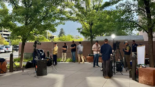 Media waits outside the Utah courthouse
