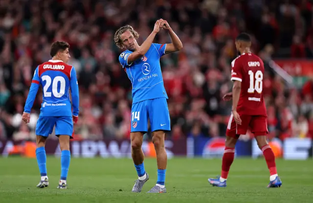 Marcos Llorente of Atletico de Madrid celebrates scoring his team's first goal during the UEFA Champions League 2025/26 League Phase MD1 match between Liverpool FC and Atletico de Madrid at Anfield on September 17, 2025 in Liverpool, England.