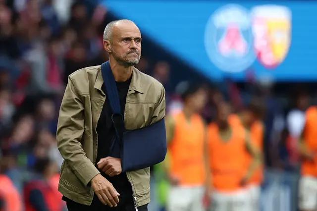 Luis Enrique in a sling