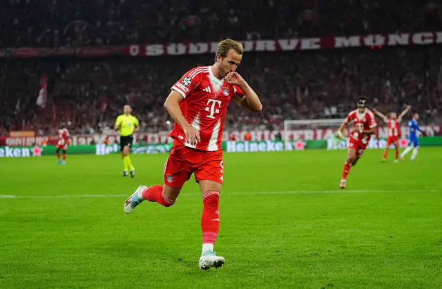 Harry Kane (Bayern Munich) scores and celebrates his teams third goal