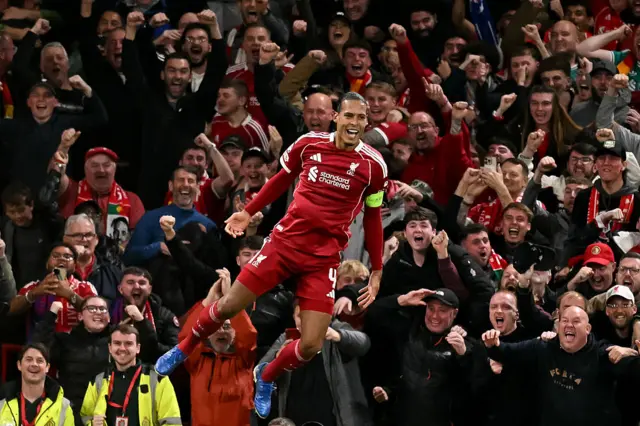 Liverpool's Dutch defender #04 Virgil van Dijk celebrates scoring his team's third goal