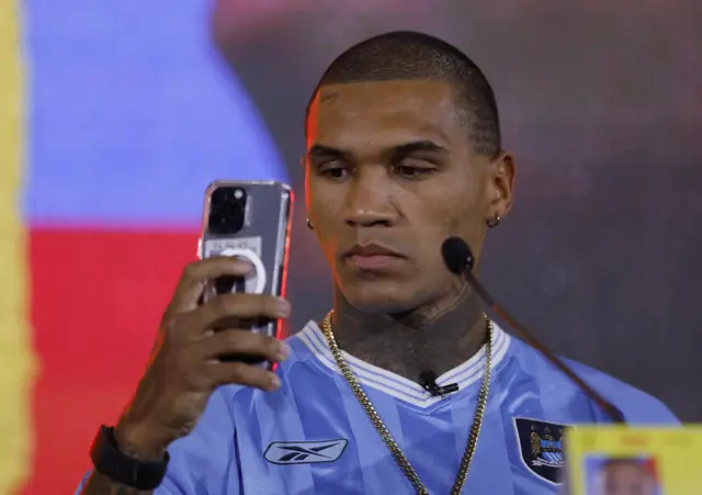 Conor Benn in a Manchester City top