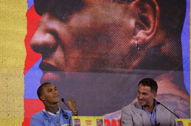 Conor Benn and Eddie Hearn laugh at a news conference