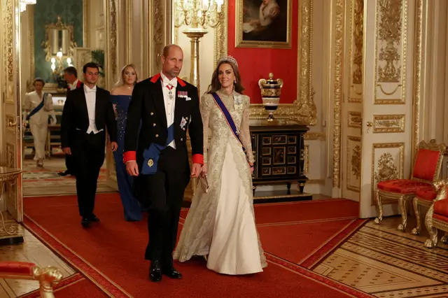 Prince and Princess of Wales walk in