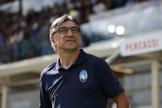 Ivan Juric looking up and smiling