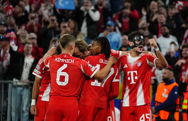 Harry Kane (Bayern Munich) scores and celebrates his teams third goal