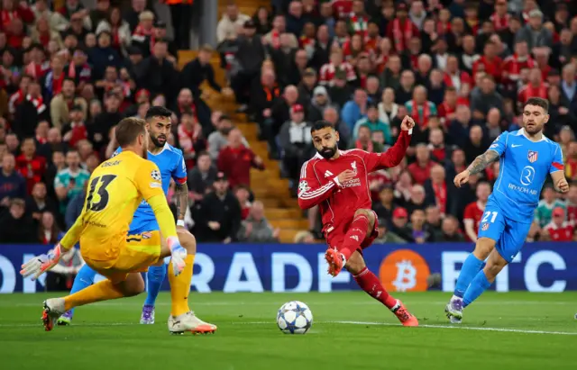 Liverpool's Mohamed Salah scores their second goal
