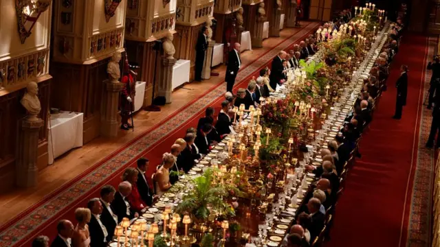 Dinner guests are seated for the US-UK state dinner as Trump speaks