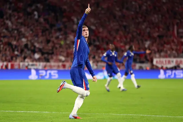Cole Palmer of Chelsea celebrates scoring his team's first goal during the UEFA Champions League 2025/26 League Phase MD1 match between FC Bayern München and Chelsea FC at Football Arena Munich on September 17, 2025 in Munich, Germany.